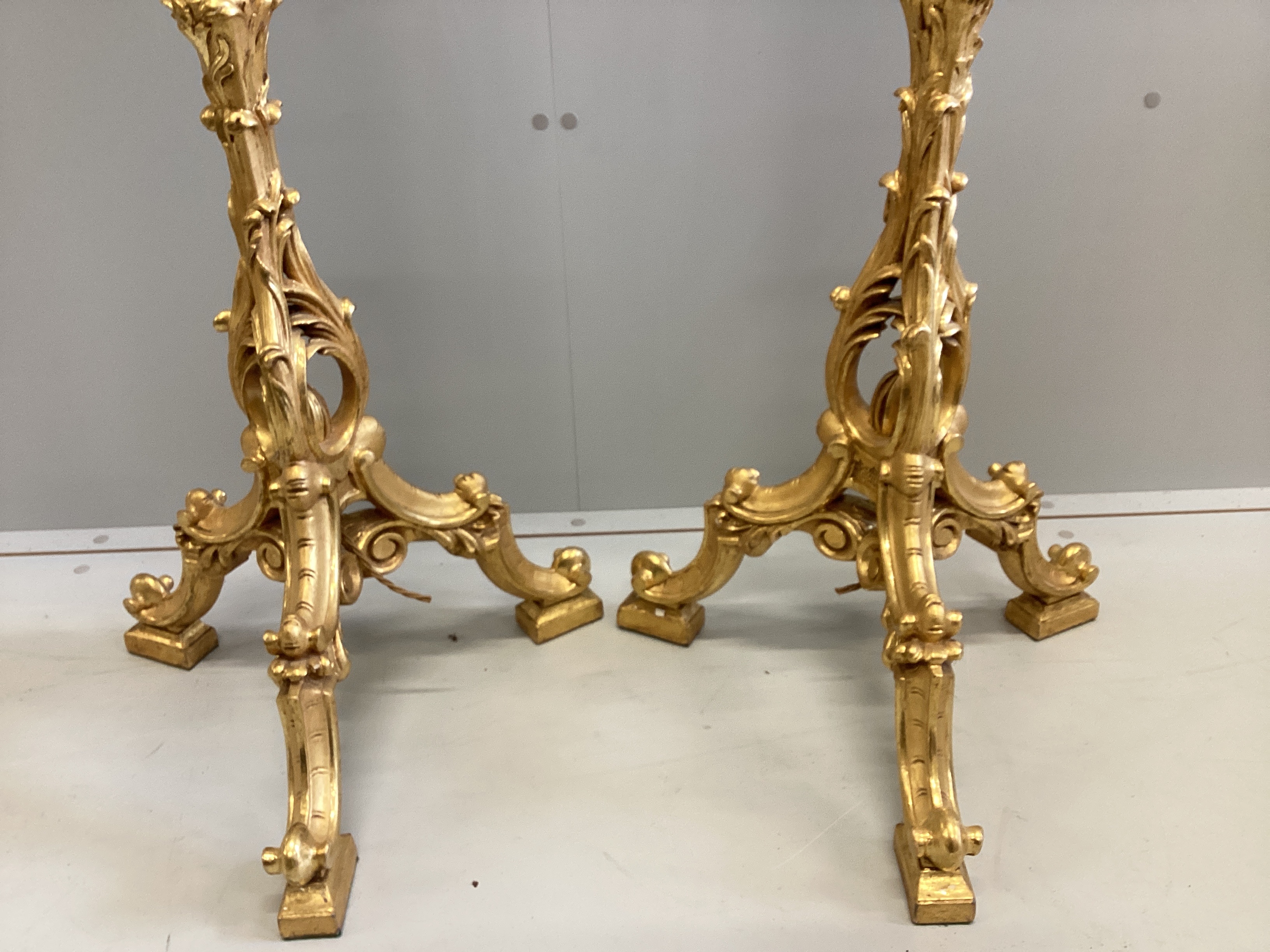 A pair of 18th century style carved gilt cluster column tripod standard lamps, height including shades 188cm